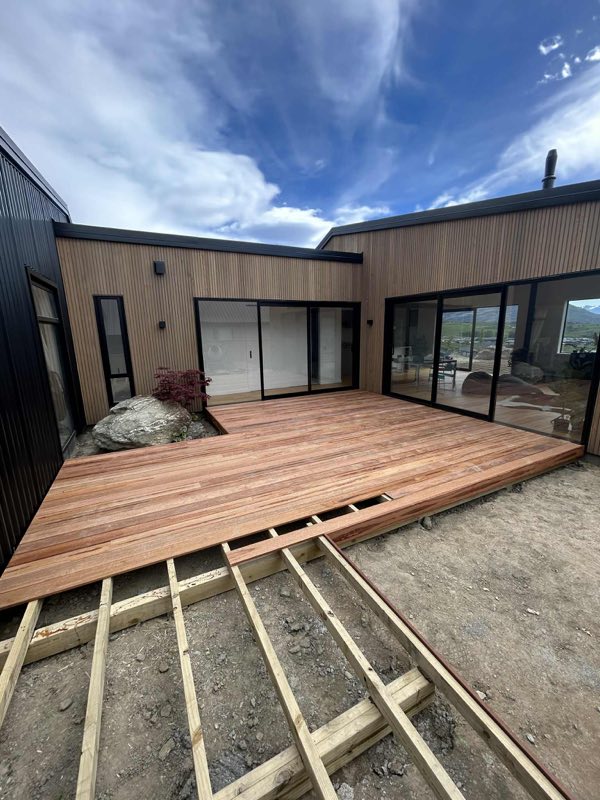 New hardwood deck laid alongside a timber-clad Queenstown home