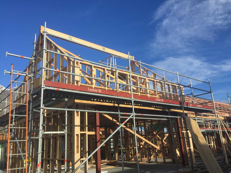 Two-storey timber framing and scaffolding at a new build